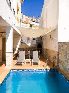 The swimming pool at or close to CASA MAR Y MONTE