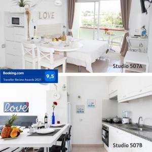 プエルト・デ・ラ・クルスにあるEdificio Las Marañuelas, Puerto La Cruz, Islas Canarias Tenerifeの白いキッチン(テーブル、シンク付)