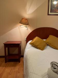 Letto o letti in una camera di Hotel Vilandre