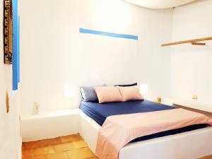 Ein Bett oder Betten in einem Zimmer der Unterkunft Ojalá Guane Barichara