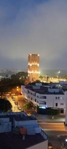 a large building with lights on top of it at night at apartment 2 bedrooms in hassan in Rabat