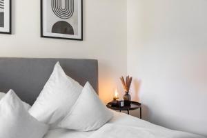 En eller flere senge i et værelse på Design Apartment „Alpenglühen“ nahe Breitachklamm