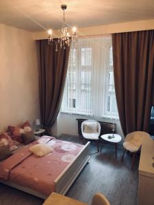 Postel nebo postele na pokoji v ubytování Tomas Apartments Gold