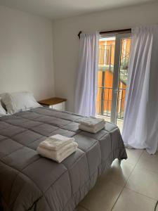 Postel nebo postele na pokoji v ubytování Victoria Plaza