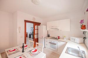 Kuchyňa alebo kuchynka v ubytovaní Apartamento Cruz de Toledo