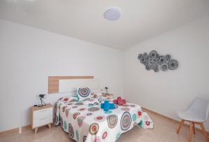 Posteľ alebo postele v izbe v ubytovaní Apartamento Cruz de Toledo
