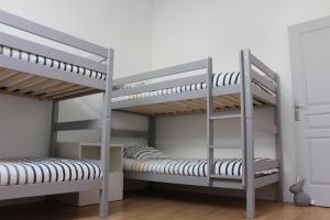 Łóżko lub łóżka w pokoju w obiekcie So Chic Kerfily