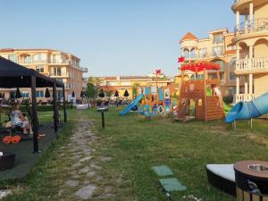 a park with a playground with a slide at Hacienda Beach Apartment mit Meerblick in Sozopol