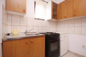 Kuchyň nebo kuchyňský kout v ubytování Apartments with a parking space Povljana, Pag - 9405