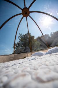 a close up of a tent on a beach at Rtanj,Vrmdza,,Hotel sa hiljadu zvezdica" in Soko Banja