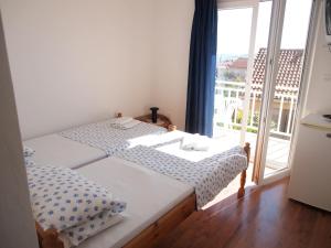 Posteľ alebo postele v izbe v ubytovaní Apartments and rooms with parking space Orebic, Peljesac - 10192