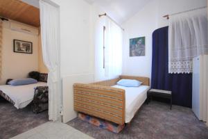 Posteľ alebo postele v izbe v ubytovaní Apartments with parking spaces Orebic, Peljesac - 10193