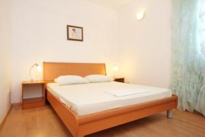 Posteľ alebo postele v izbe v ubytovaní Apartments with parking spaces Orebic, Peljesac - 10075