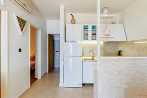 Η κουζίνα ή μικρή κουζίνα στο Apartment Prizba 10063c +17 φωτογραφίες