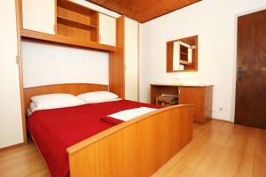 Postel nebo postele na pokoji v ubytování Apartments with parking spaces Orebic, Peljesac - 10102