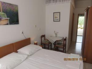 Ένα ή περισσότερα κρεβάτια σε δωμάτιο στο Studio Drace 10135a