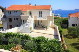 a house with a view of the water at Apartments with parking space Orebic, Peljesac - 10173 in Orebić