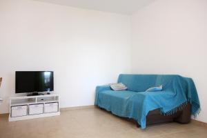 TV a/nebo společenská místnost v ubytování Apartments with a parking space Kuciste - Perna, Peljesac - 10161
