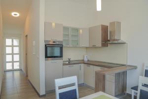 Kuchyň nebo kuchyňský kout v ubytování Apartments with a parking space Hvar - 11681