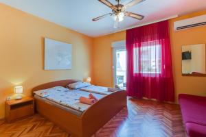 Posteľ alebo postele v izbe v ubytovaní Rooms with a parking space Mali Losinj (Losinj) - 9681