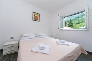 Fotografie z fotogalerie ubytování Apartments with a parking space Podaca, Makarska - 11748 v destinaci Podaca