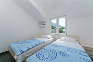 Fotografie z fotogalerie ubytování Apartments with a parking space Podaca, Makarska - 11748 v destinaci Podaca
