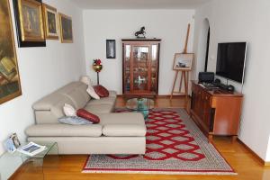 a living room with a couch and a tv at Apartments with WiFi Split - 11783 in Split