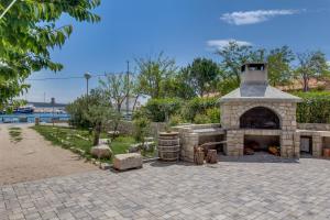 Vonkajšia záhrada v ubytovaní Apartments and rooms by the sea Nerezine, Losinj - 11815