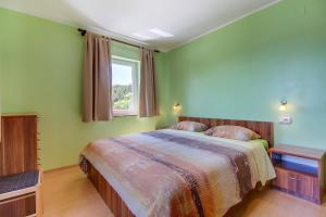 Posteľ alebo postele v izbe v ubytovaní Apartments and rooms by the sea Nerezine, Losinj - 11815