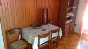 a room with a table and two chairs and a table at Apartments with a parking space Smrika, Kraljevica - 12055 in Šmrika