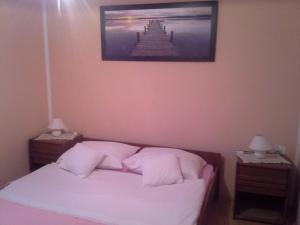 Posteľ alebo postele v izbe v ubytovaní Apartments with a swimming pool Crikvenica - 12116
