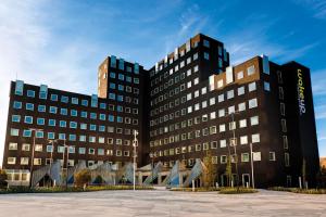 a rendering of the front of the building at Wakeup Copenhagen - Carsten Niebuhrs Gade in Copenhagen