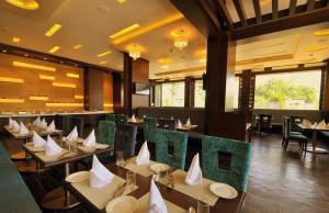 En restaurang eller annat matställe på Hotel Marigold Jaipur
