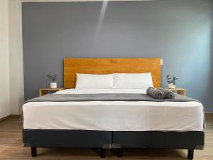Łóżko lub łóżka w pokoju w obiekcie Casa Joseffa