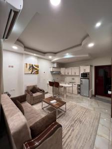 Al Deafah Hotel Apartment الضيافة للشقق الفندقية tesisinde mutfak veya mini mutfak