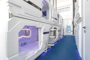 an empty hospital room with a corridor at CAPS LOCK Airport Hotel in Astana