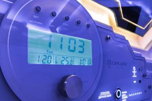 a close up of a digital scale with the clock on it at CAPS LOCK Airport Hotel in Astana