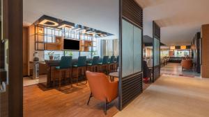 ibis Bengaluru Hebbal - An Accor Brand的电视和/或娱乐中心