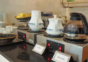 Kuchyň nebo kuchyňský kout v ubytování Kingston Suites Bangkok