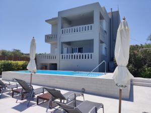 Πισίνα στο ή κοντά στο Villa Kelaidis