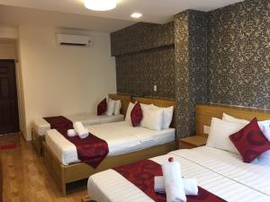 Postel nebo postele na pokoji v ubytování Ailen Garden 2 Hotel