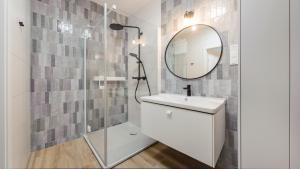 Kúpeľňa v ubytovaní Apartamenty Sun & Snow Polanki Aqua z basenem
