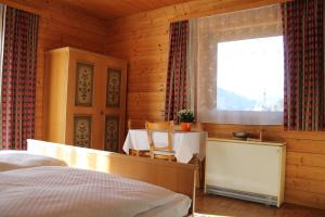 Voodi või voodid majutusasutuse Gästehaus Moser toas