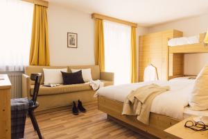 Postel nebo postele na pokoji v ubytování Posthotel