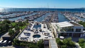 an aerial view of a marina with boats in the water at Marina di Scarlino Resort in Puntone di Scarlino