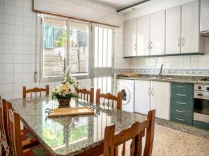 Kuchnia lub aneks kuchenny w obiekcie PARAISO RIAS BAIXAS II Combarro