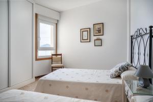 Łóżko lub łóżka w pokoju w obiekcie PARAISO RIAS BAIXAS II Combarro