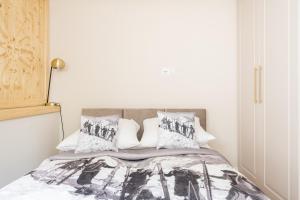 Posteľ alebo postele v izbe v ubytovaní Villa Monte w Centrum przy Krupówkach APARTZAKOP