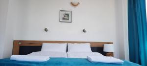 Postel nebo postele na pokoji v ubytování Къща за гости Вивиан + 24 fotografií