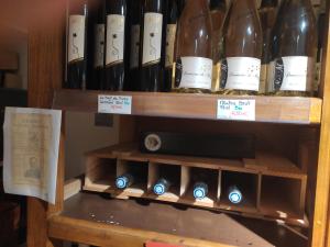a bunch of bottles of wine on a shelf at My Tasse de Thé in Saint-Maurice-sous-les-Côtes +20 photos